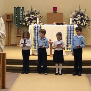The 2nd graders doing the petitions at the St. Nicholas mass.