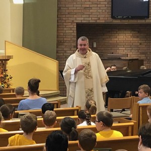 Father Tim giving the homily at All Saints Day mass, our November monthly liturgy.